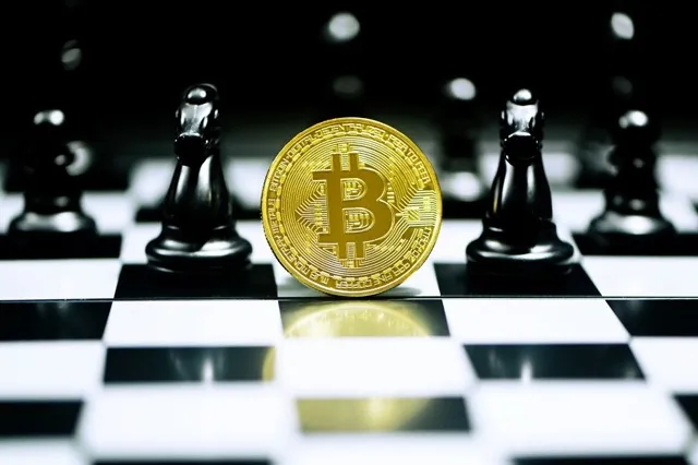 A golden coin with the Bitcoin logo on it, surrounded by chess pieces on a chessboard.
